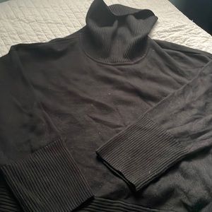 Black turtle neck sweater